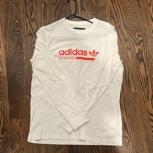 White long sleeve Addidas t-shirt.